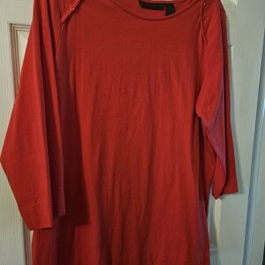 Red long sleeve tee.